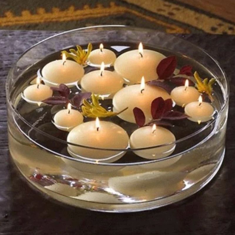 Bougie Décorative Flottante, dans un bougeoir avec de l'eau.