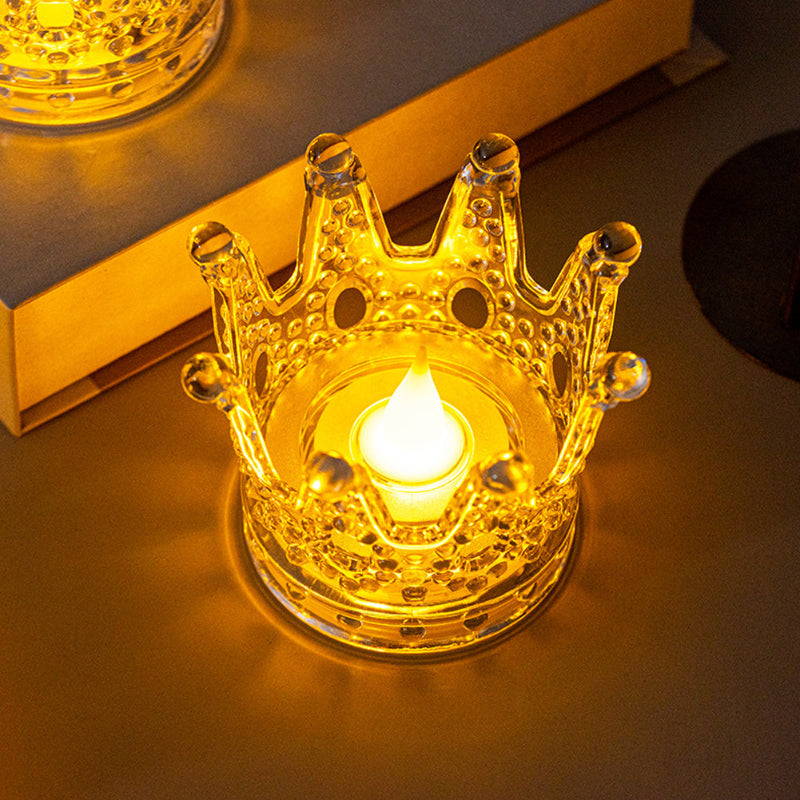 Bougie De Noël LED Couronne, allumée et disposée sur une table. Ambiance festive.