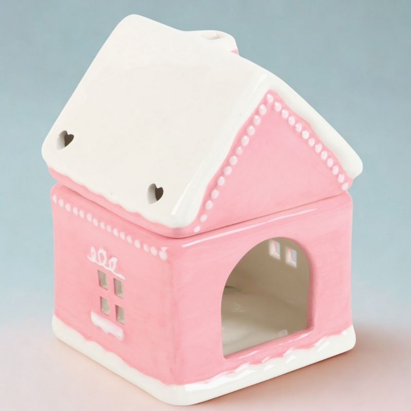 Brule Parfum Maison Pain D'Épices Rose, on peut voir le dos du brûleur avec la fente pour insérer la bougie chauffe-plat.