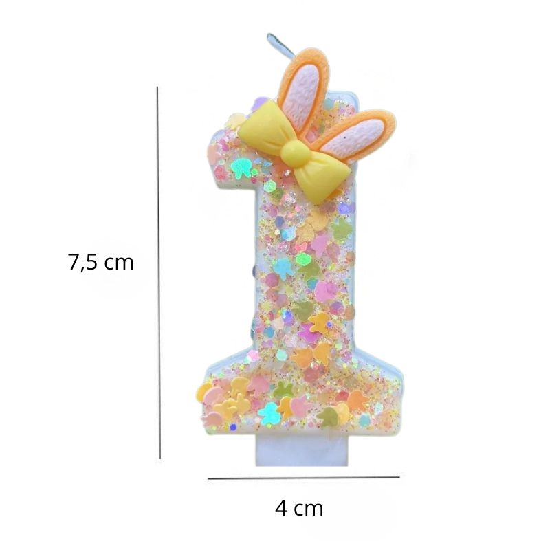 Bougie Anniversaire Douce Fantaisie, avec ses dimensions, le chiffre de la bougie est le 1 et sur fond blanc.