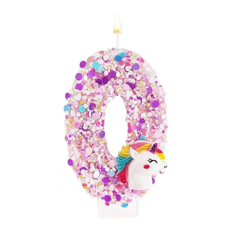 Bougie Anniversaire Licorne Explosion de Paillettes, le chiffre de la bougie est le 0. De couleur rose et sur fond blanc.