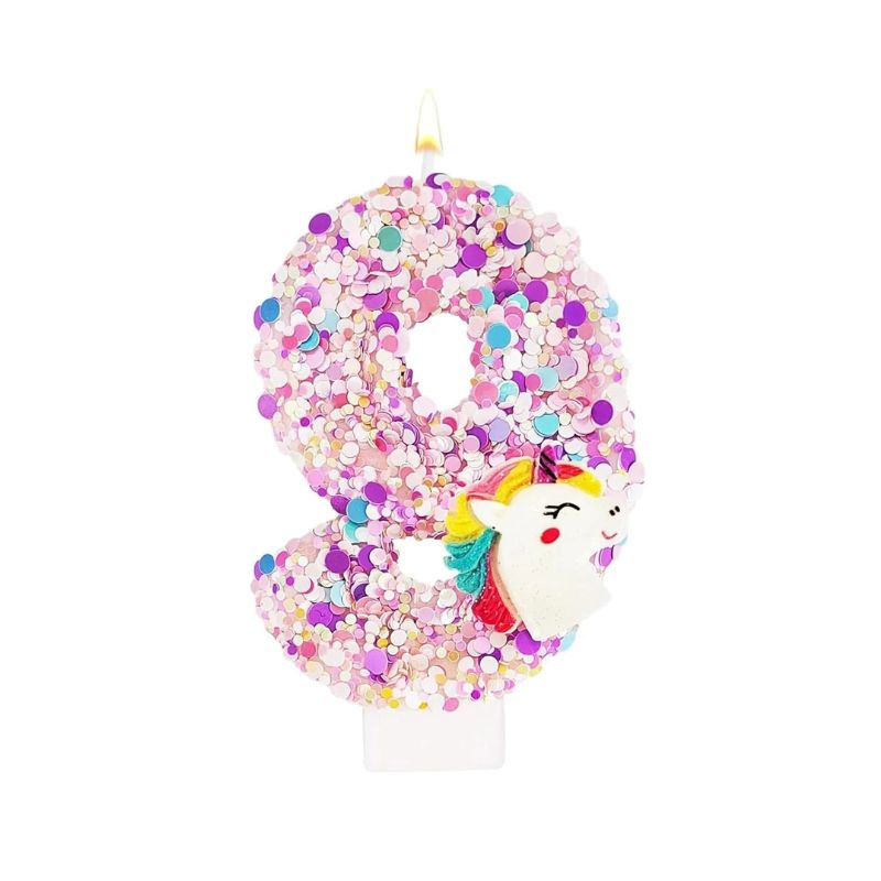 Bougie Anniversaire Licorne Explosion de Paillettes, le chiffre de la bougie est le 9. De couleur rose et sur fond blanc. Anniversaire Chiffre Paillette avec Licorne