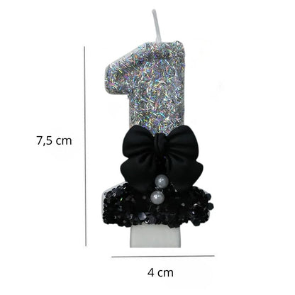 Bougie Anniversaire Nœud Chic, avec ses dimensions et sur fond blanc. Le chiffre représenté est le 1.