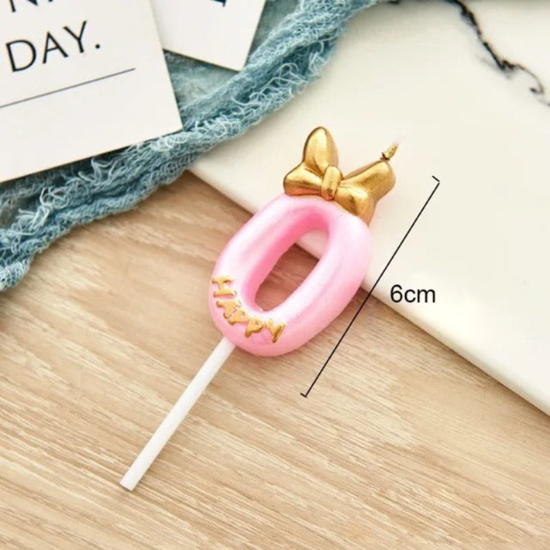 Bougie Chiffre Rose Girly et Chic, avec sa dimension et le chiffre est le 0.