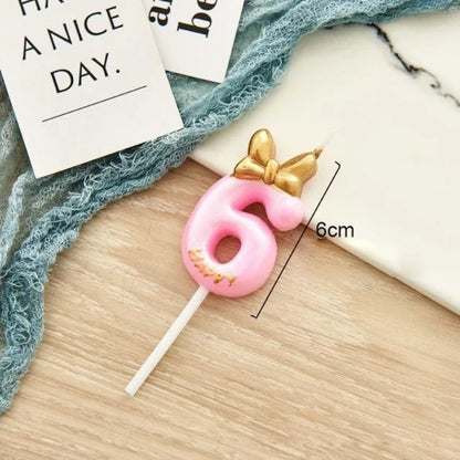 Bougie Chiffre Rose Girly et Chic, le chiffre est le numéro 6.