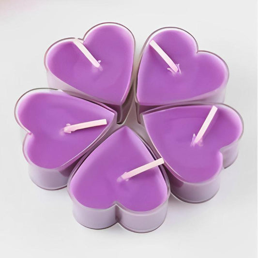 Bougie Décorative Chauffe Plat Cœur Lot 9 pièces, de couleur violette et sur fond blanc cassé.