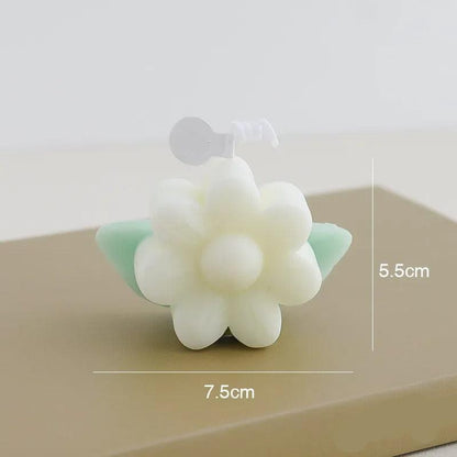 Bougie Décorative Pâquerette, de couleur blanche et avec ses dimensions.