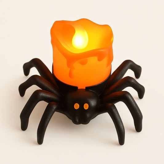 Bougie Halloween Terreur Lumineuse, une araignée de couleur noire et orange à LED et sur fond beige clair.