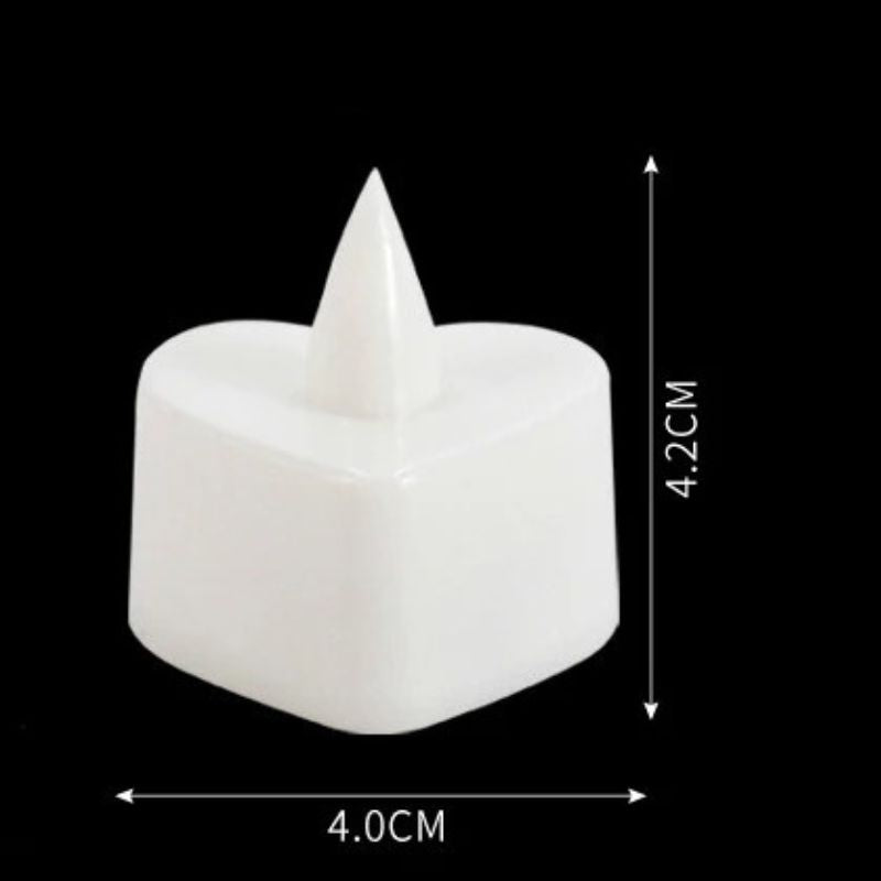 Bougie LED Chauffe Plat Cœur, avec ses dimensions et sur fond noir.