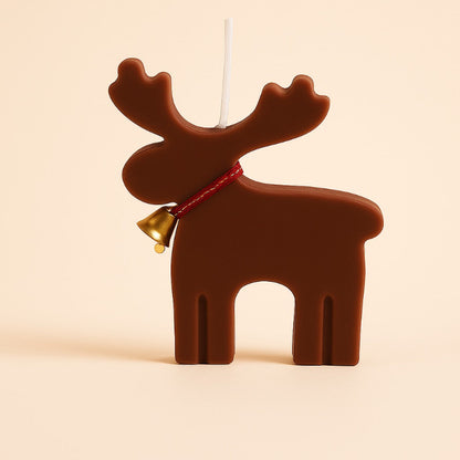 Bougie Noel Féérie du Renne Enchanté, de couleur marron et sur fond beige.