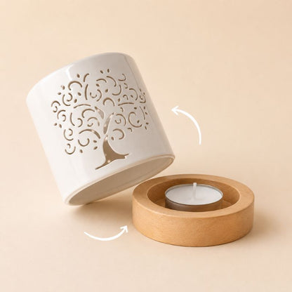 Brule Parfum Arbre de Vie Blanc en deux parties, avec corps en céramique amovible et base effet bois accueillant une bougie chauffe-plat pour une utilisation pratique et un entretien facilité.