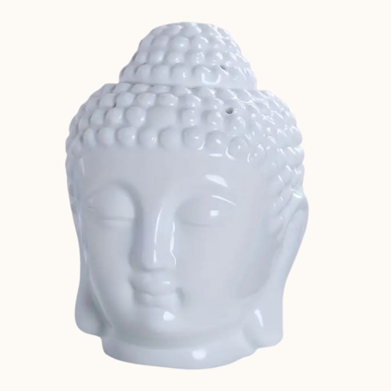 Brule Parfum Bouddha Blanc Élégant avec tête amovible pour fondant parfumé et sur fond beige clair.