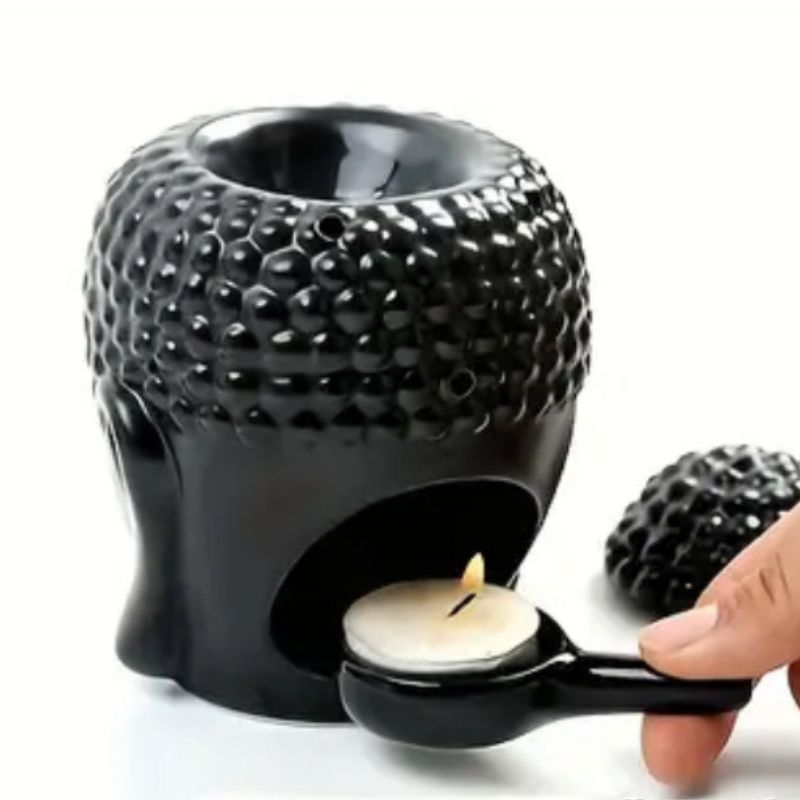 Brule Parfum Bouddha Noir Élégant, démonstration de comment on insère la bougie.