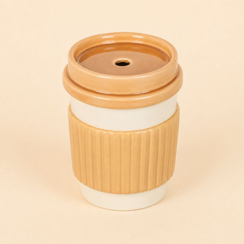 Brule Parfum Café À Emporter en céramique beige sur fond clair.