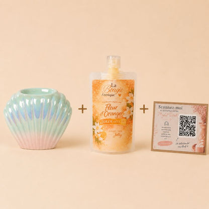 Coffret Détente avec Brule Parfum Coquillage Nacré, Fondant Fleur d’Oranger et Playlist Bien-Être et sur fond beige.