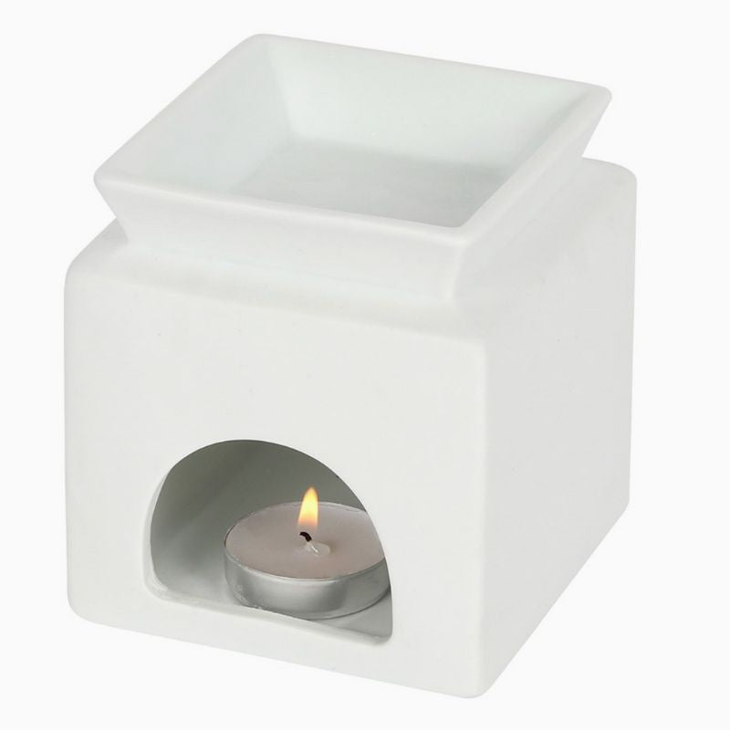 Brule Parfum Design Élégant, on peut voir l’arrière du brûleur, il y a une bougie de disposée à l’intérieur.