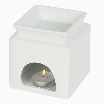 Brule Parfum Design Élégant, on peut voir l’arrière du brûleur, il y a une bougie de disposée à l’intérieur.