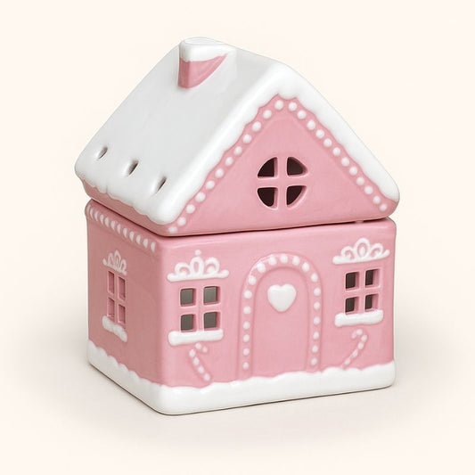 Brule Parfum Maison Pain D'Épices Rose, de couleur rose et blanche, sur fond beige clair.