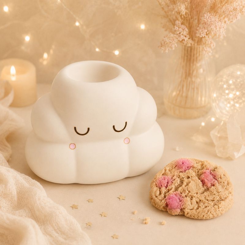 Brule Parfum Nuage Rêveur en céramique blanche avec fondant parfumé, dans une ambiance cocooning et chaleureuse.