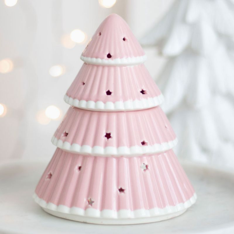 Brule Parfum Sapin Rose Féérique, le brûleur n'est pas allumé et dans une ambiance féerique.