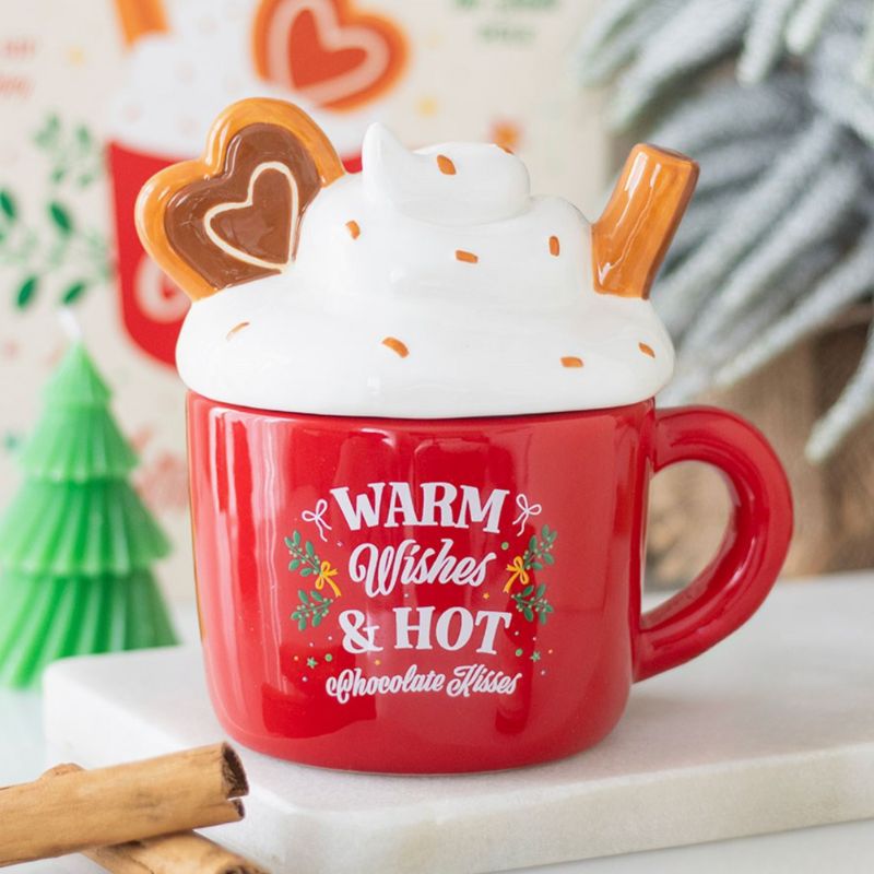 Brule Parfum XL Gourmandise de Noël, le mug bruleur est posé sur une table blanche dans une ambiance de Noël.