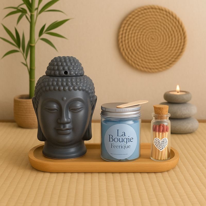 Coffret Bougie Magie des Senteurs, le coffret est posé sur un tapis et dans une ambiance zen.