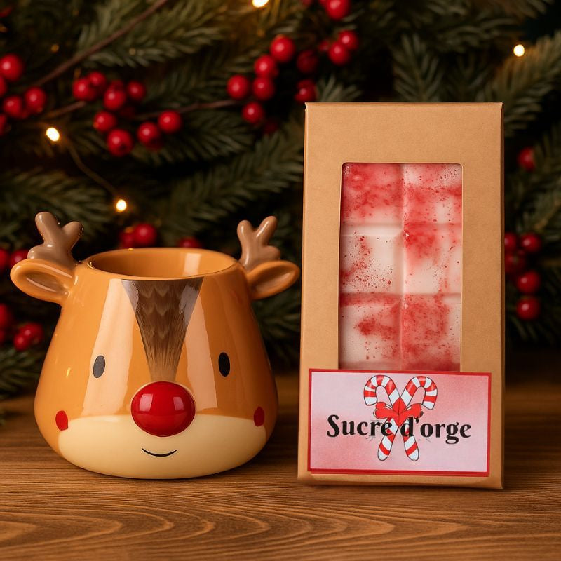Fondant Parfumé Tablette Sucre d'Orge, disposée à côté d'un brûleur en forme de renne et dans une ambiance festive.