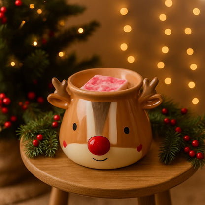 Fondant Parfumé Tablette Sucre d'Orge, disposée dans le brûleur en forme de renne et dans une ambiance de Noël.