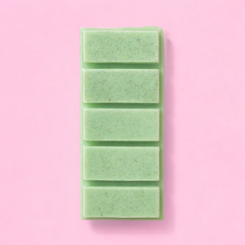 Fondant Parfumé Thé Vert Snapbar vert en tablette sécable sur fond rose design minimaliste ambiance fraîche et naturelle.