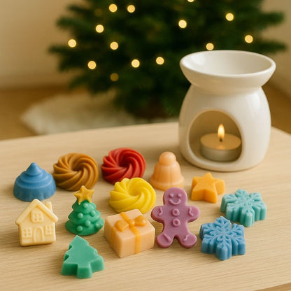 Idée Cadeau Boule Parfumée de Noël, tous les fondants parfumés sont disposés sur une table à côté d'un brûleur.