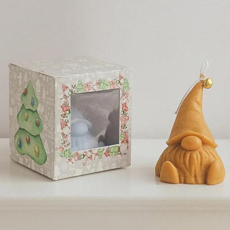 Bougie Décorative Gnome et de couleur ocre. 