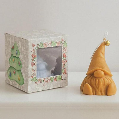 Bougie Décorative Gnome et de couleur ocre. 