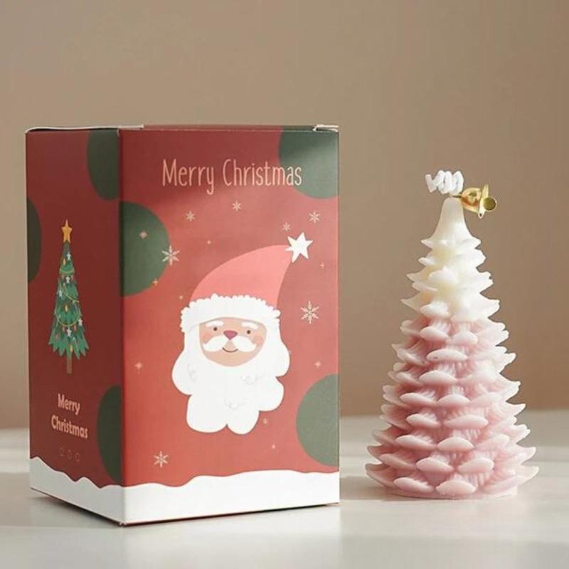 Bougie Noël Magique et Sapin Senteur d’Hiver, de couleur blanche et rose, avec sa boite de protection.